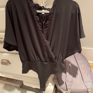 ASOS black bodysuit with criss cross lace trim